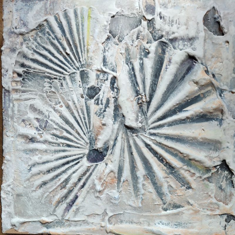 An abstract painting depicting grey shells.