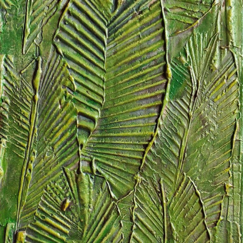 The painting of multiple big leafs, showing strong lines of the paint.